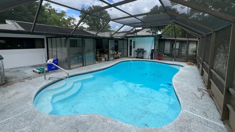 Neglected pool before