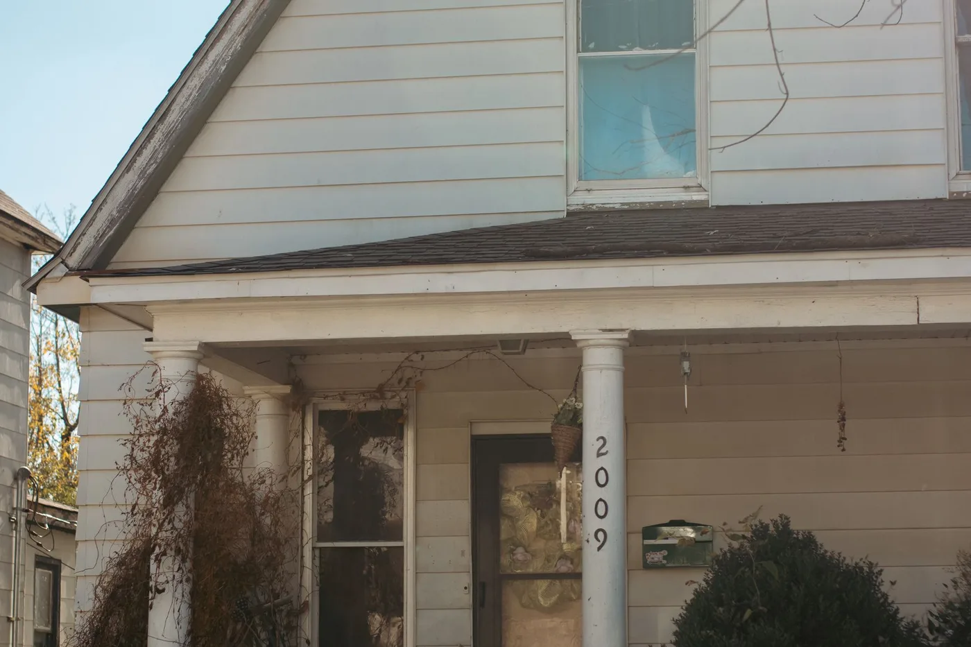 A modest older single-family house on an ordinary Birmingham, Alabama street