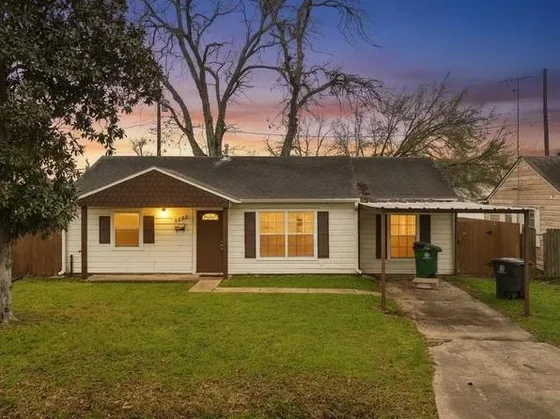 A modest inherited home on a quiet Texas street