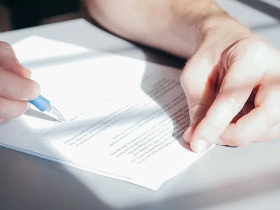 A title company sorting out lien payoffs before closing in Georgia
